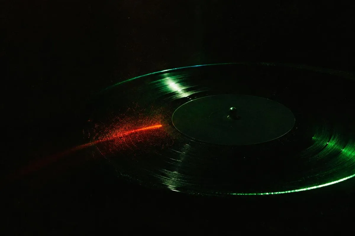 Vinyl record in green rim light